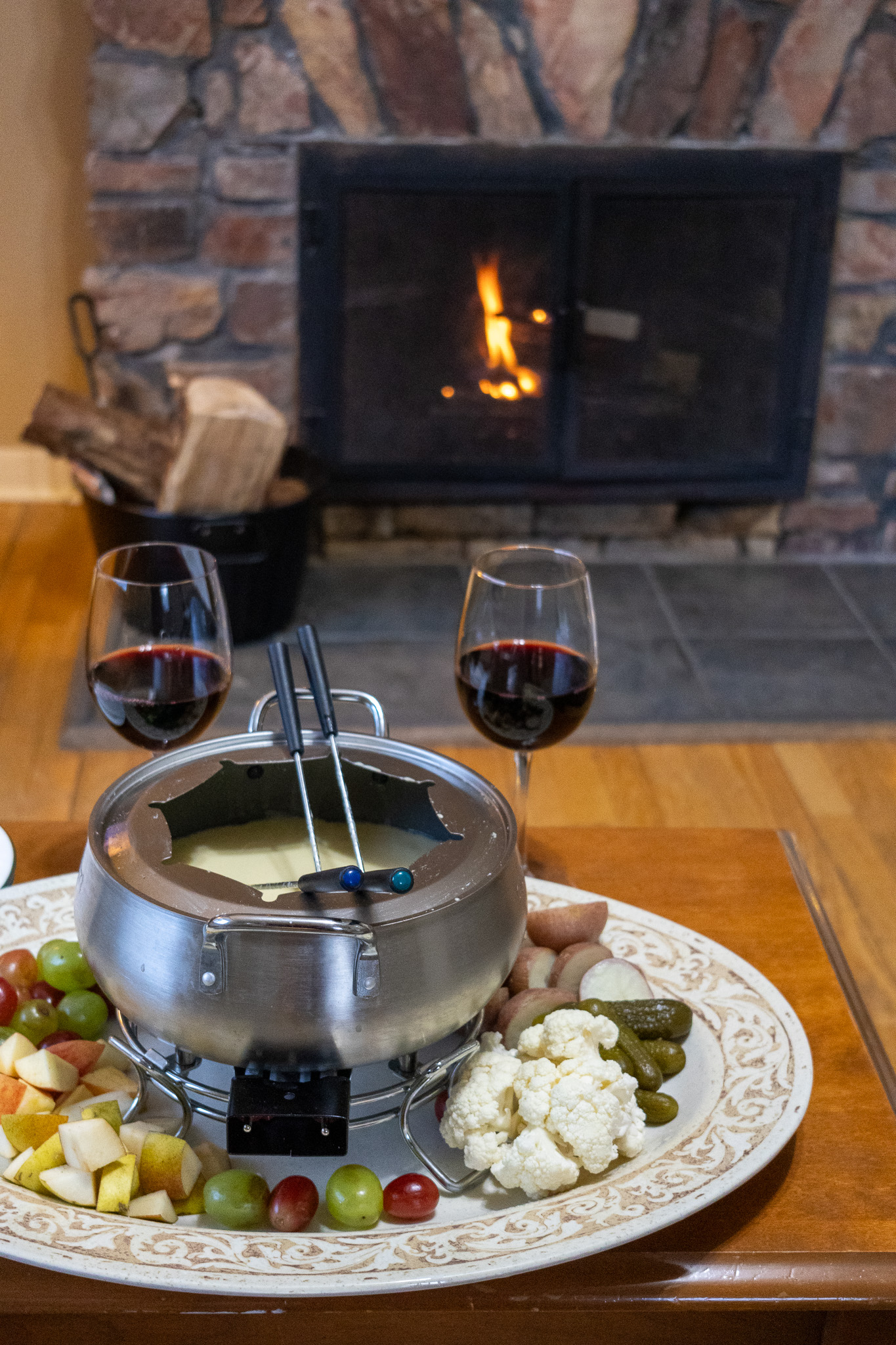 Fondue in front of a fireplace at Digby Pines
