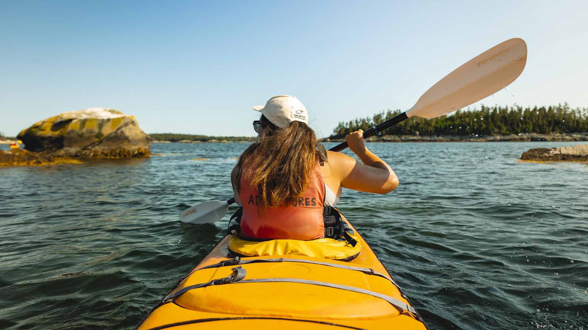 Woman kayaking at Taylor Head