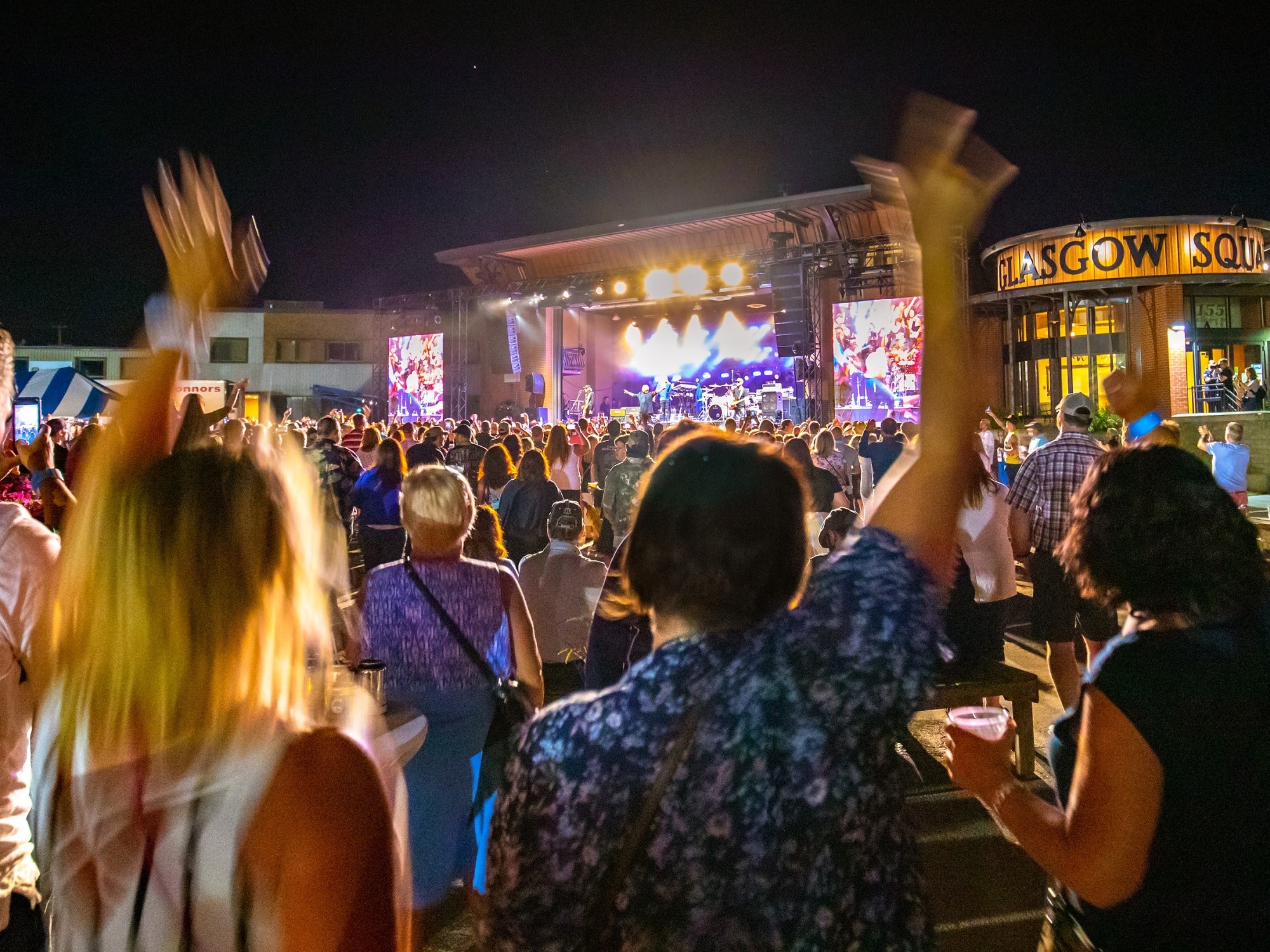 A crowd enjoys a concert during a music festival
