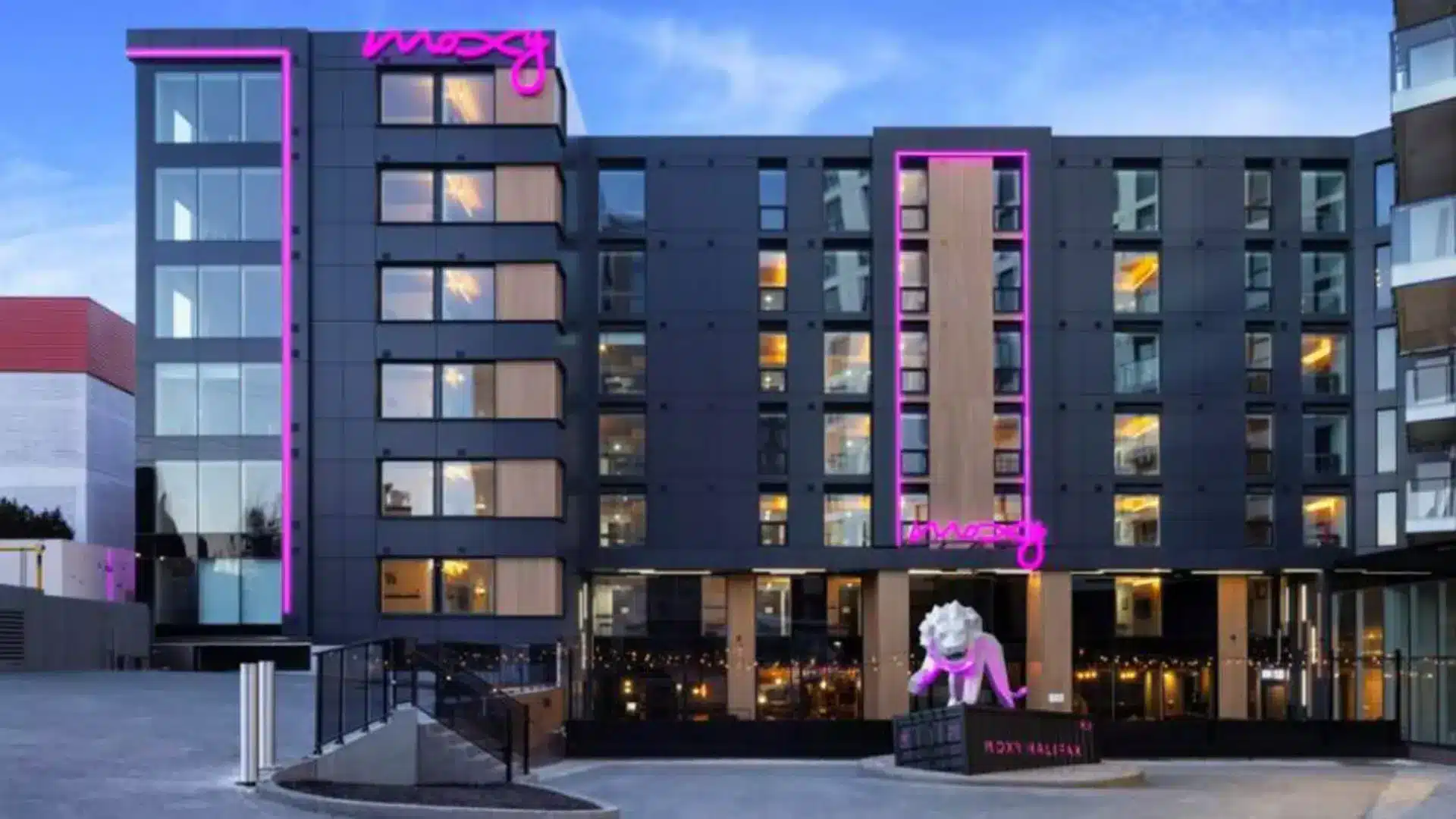 Entrance of the Moxy Marriott Halifax, a boutique hotel, with it's lion on a seacan monument - the lion a call to the Nova Scotia coat of arms and the seacan for our port-side city in Nova Scotia
