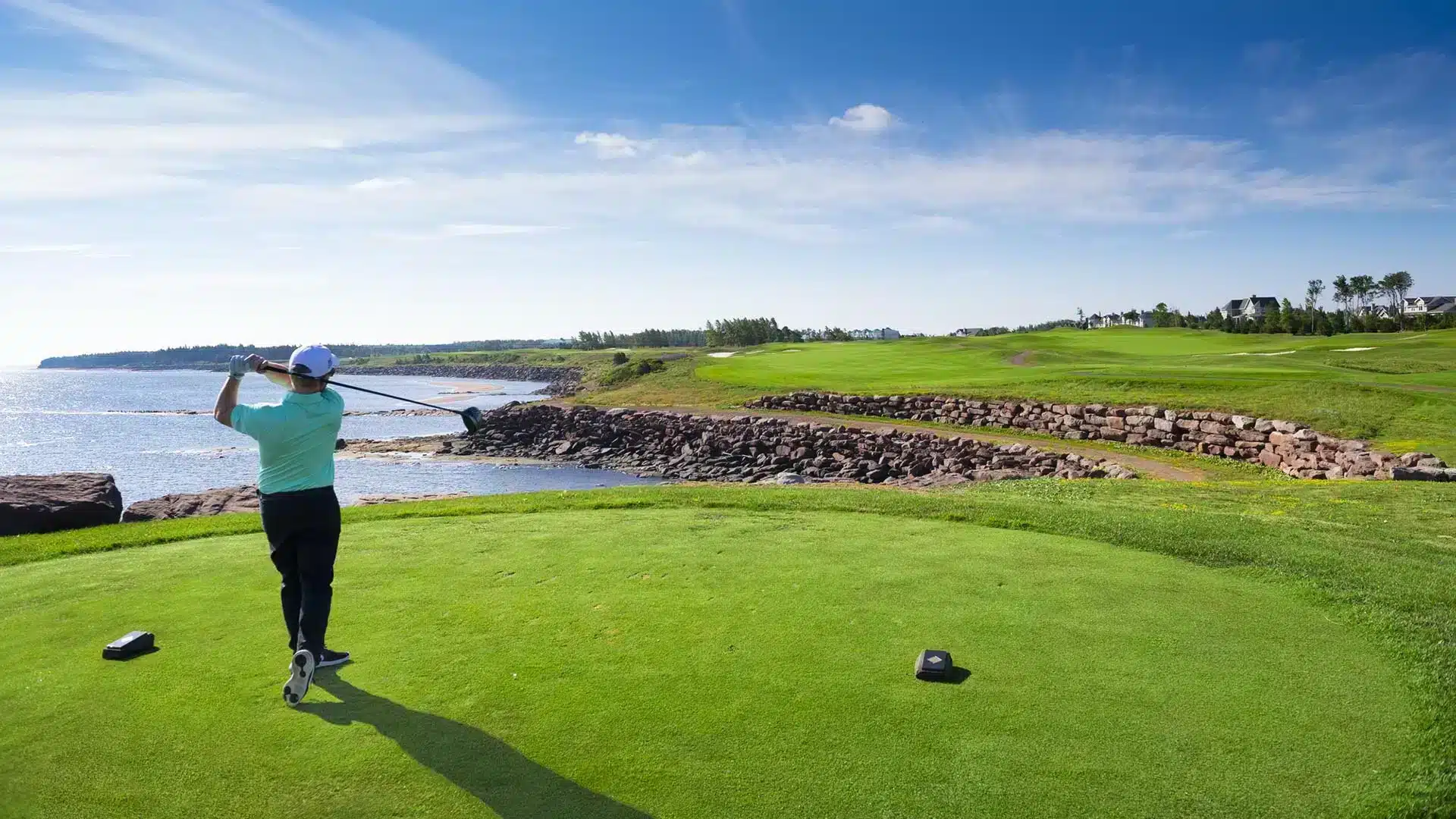 A golfer on the course at Fox Harb'r