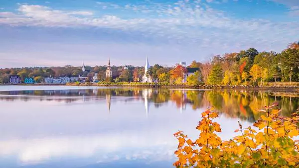The view of Mahone Bay, Nova Scotia's iconic Three Churches from across the water